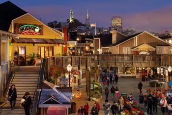 Night view of Pier 39 with San Francisco in the background.